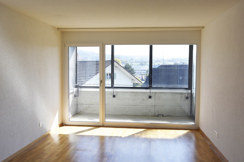 Wohnzimmer mit Balkon